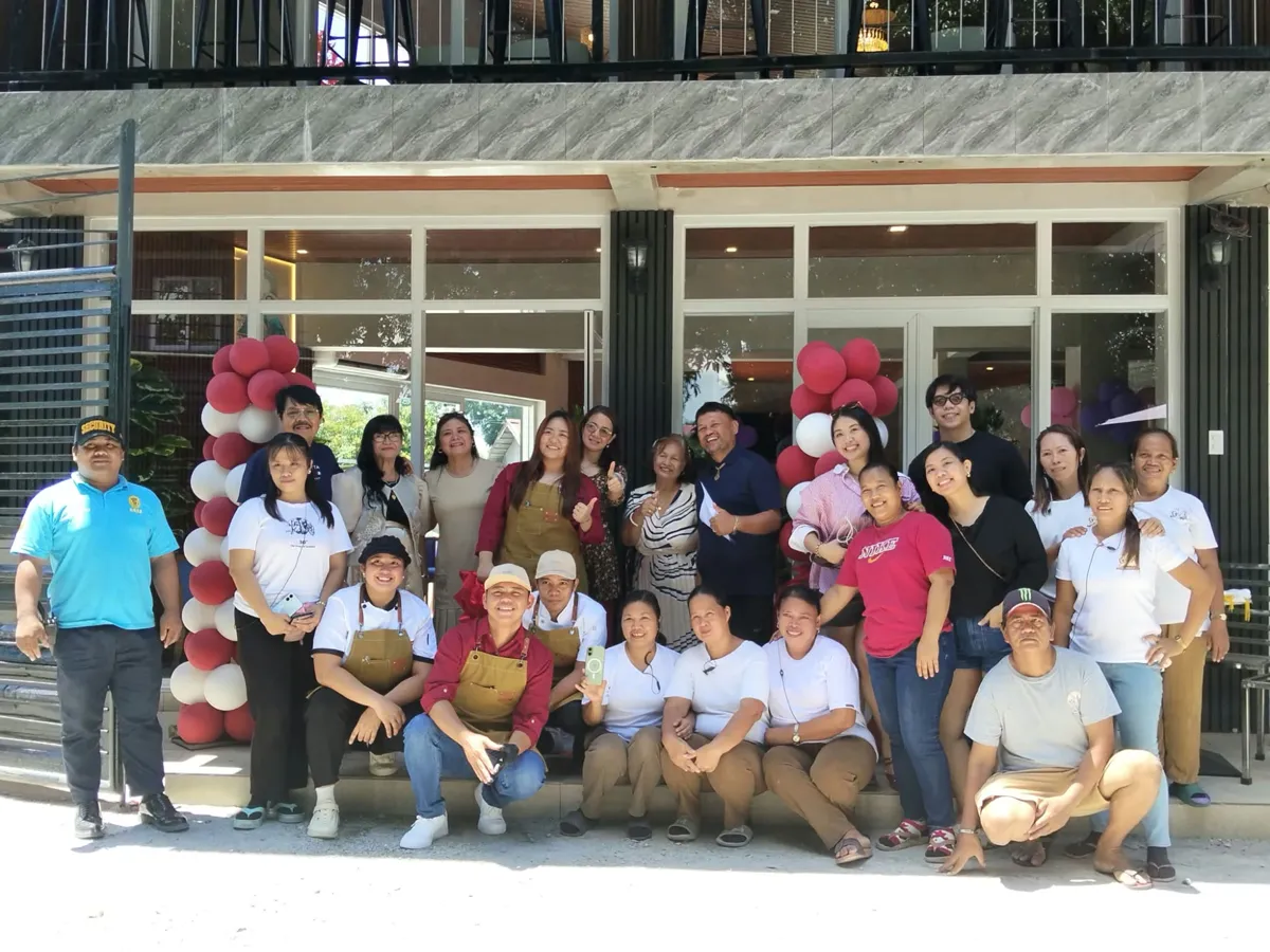 The Pro/Beans team and family in front of the café on opening day